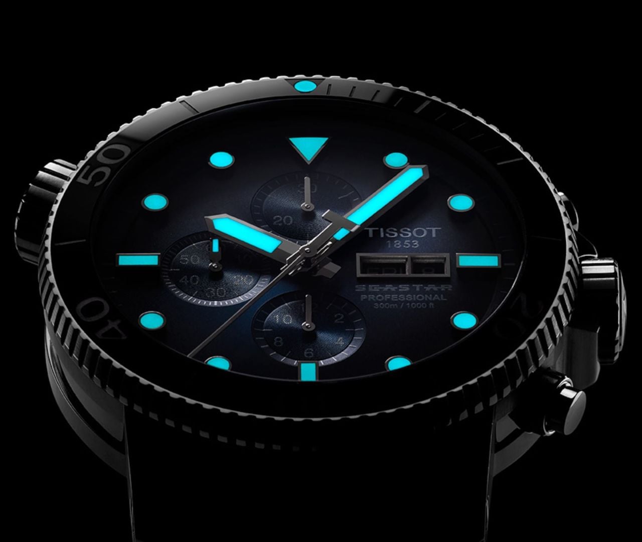 Tissot Super-LumiNova technology photograph showing luminous hands and markers in darkness